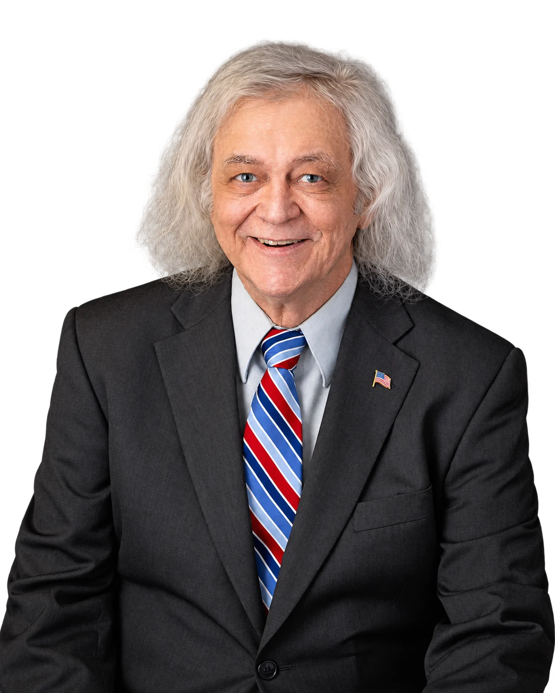 Ken Krizan, author, in a dark suit and striped tie