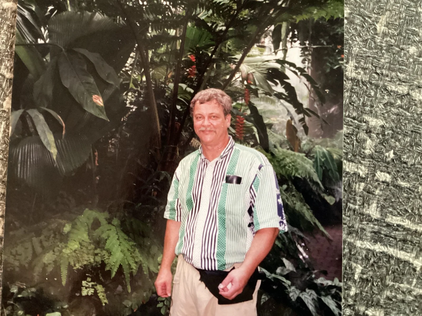 Ken Krizan surrounded by greenery